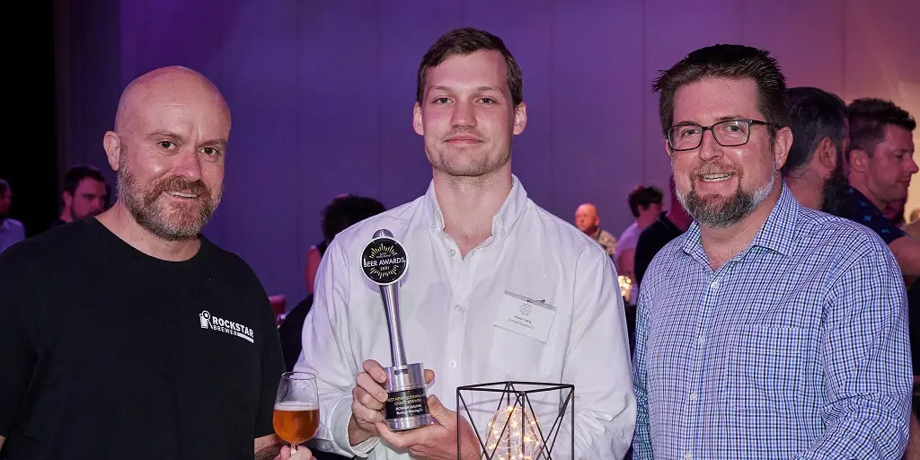 From left - Judge Steve Henderson, Rowan Haling from Burleigh Brewing Co and Matt Adams from Treasury Brisbane