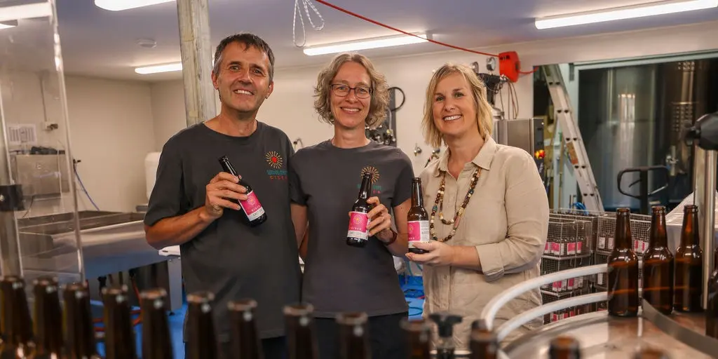 Sunshine Coast Cider founders Martin and Regine with Food & Agribusiness Network CEO, Emma Greenhatch