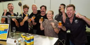 The team of Moffat Beach Brewing Co celebrating winning 2023 Grand Champion Beer